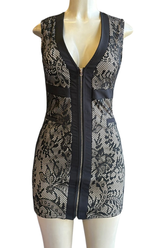 Black lace dress with a zipper on a mannequin against a white background