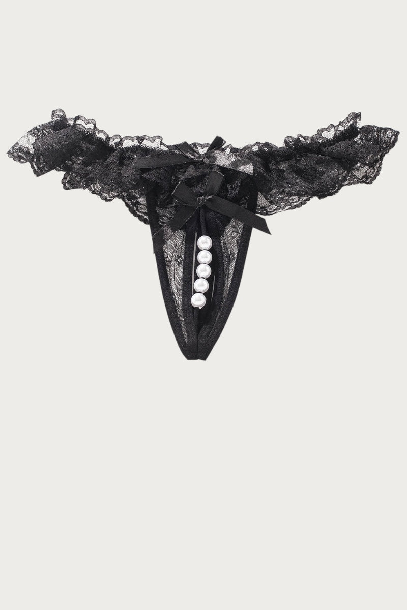 Black lace thong with pearls on a white background