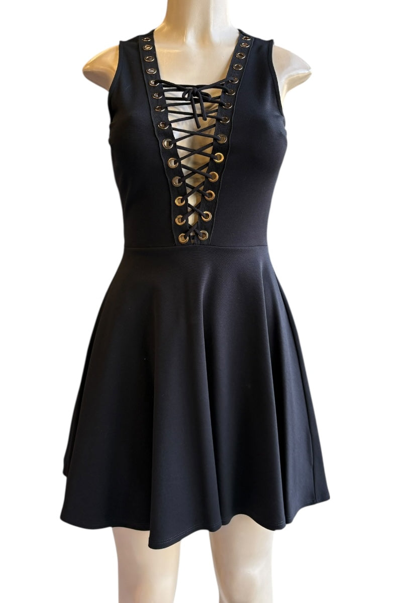 Black dress with lace-up front on a mannequin against a white background