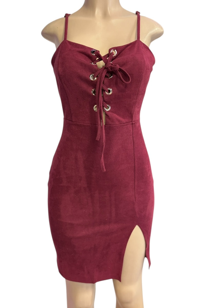 Wine dress with lace-up front on a mannequin against a white background