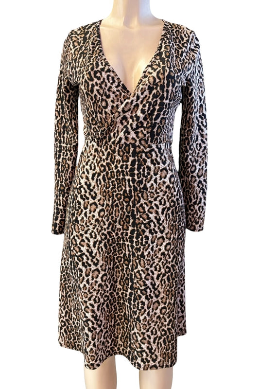 Leopard print dress on a mannequin against a white background