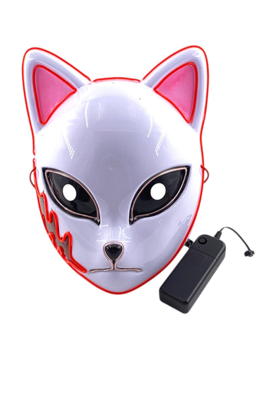 White cat mask with pink accents and a remote control on a white background