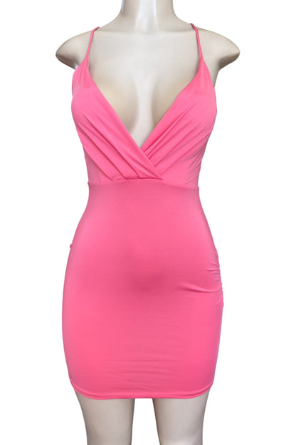 Pink dress on a mannequin against a white background