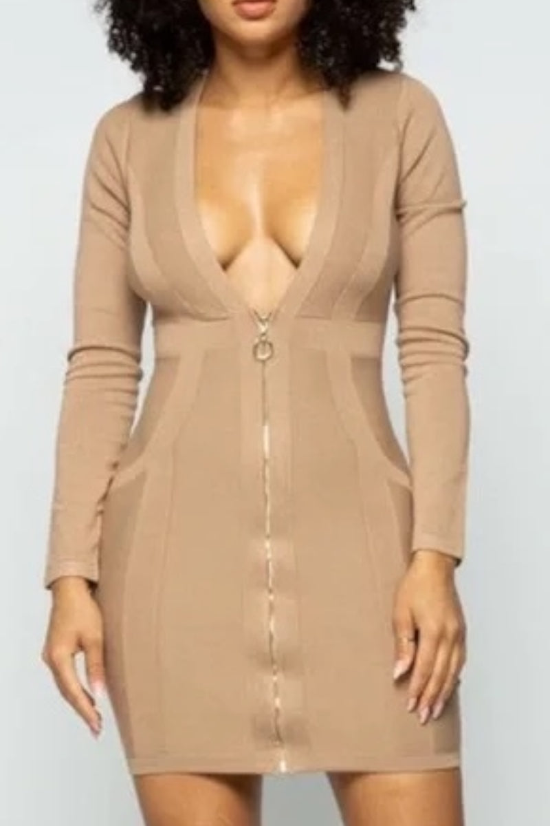 Beige dress with a plunging neckline on a plain background