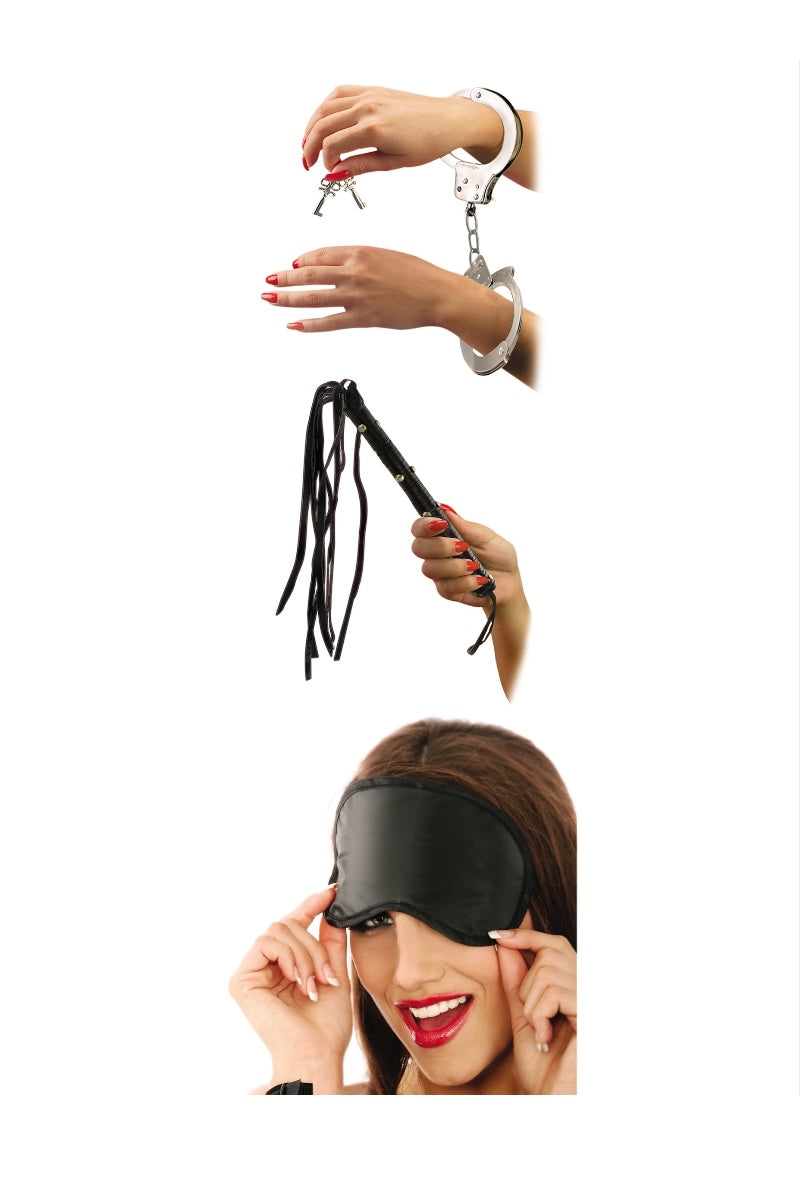 Black blindfold, black flogger, and handcuffs on a white background