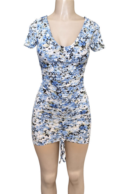 blue Floral dress on a mannequin against a white background