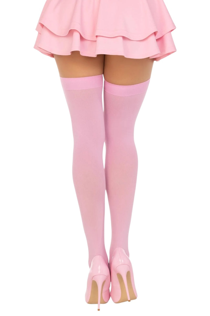 Pink knee-high socks and skirt on a white background