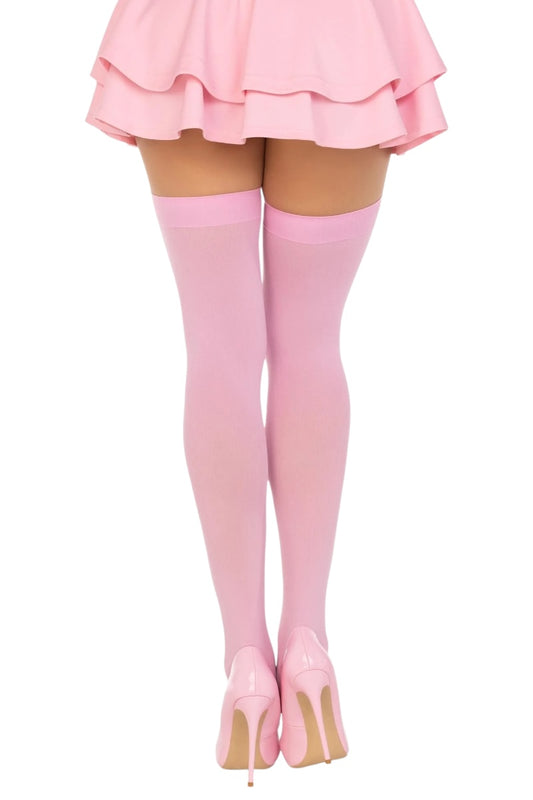 Pink knee-high socks and skirt on a white background