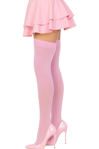 Pink knee-high socks and high heels on a white background