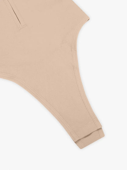 Beige top close up on a white background