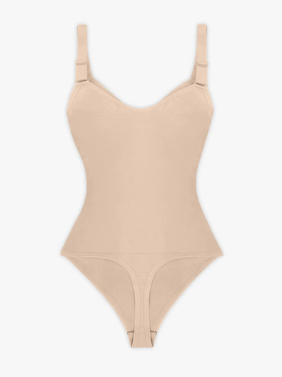 Beige bodysuit with thin straps on a white background