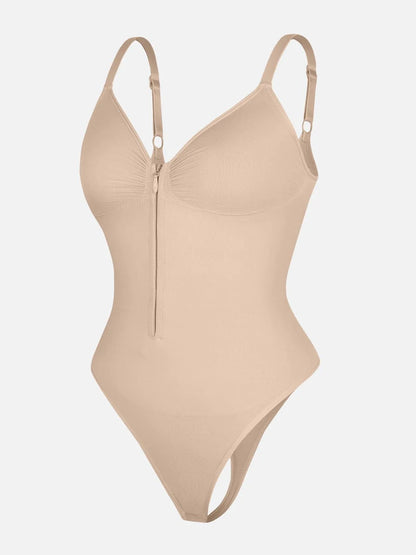 Beige one-piece bodysuit on a white background