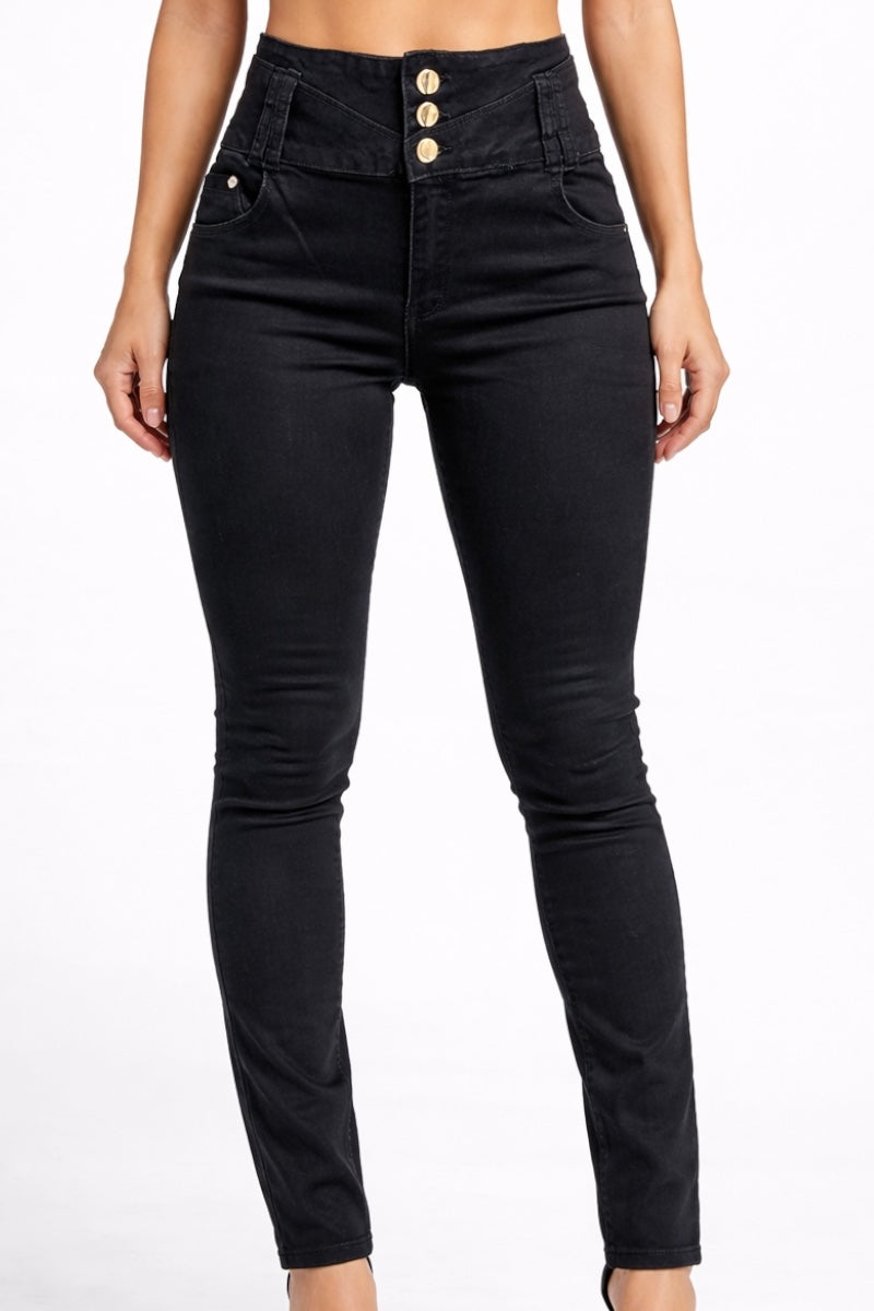 Black jeans with gold buttons on a white background