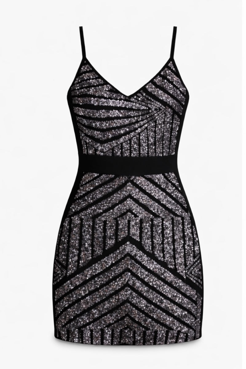 Black and silver zigzag patterned dress on a white background