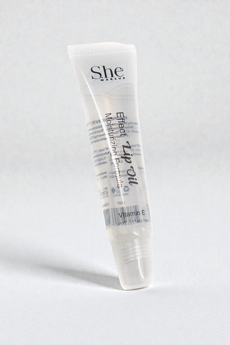 She Moisture lip balm tube on a white background