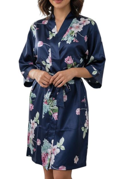 Navy floral satin robe worn by a model on a white background