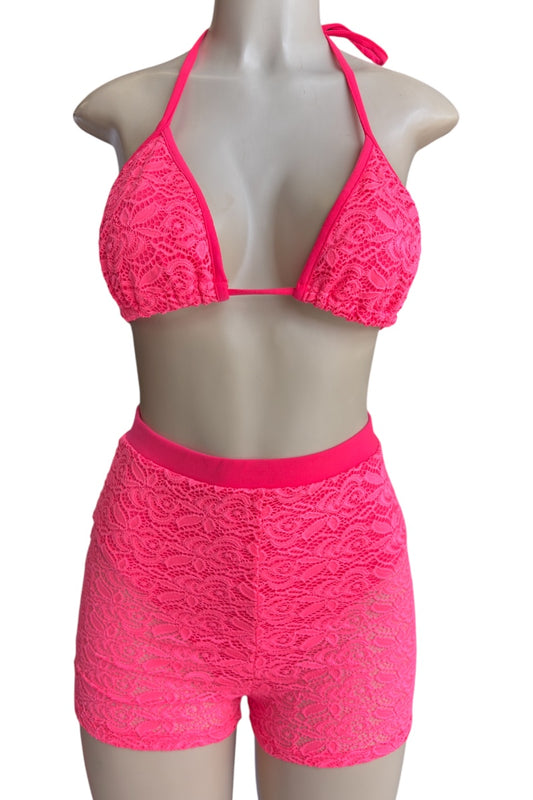 Pink lace bikini set on a mannequin against a white background