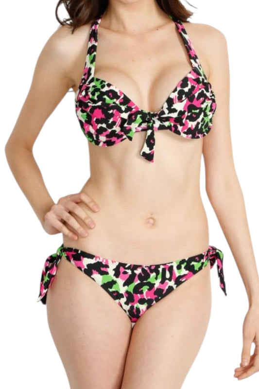 Woman wearing a colorful bikini with a white background