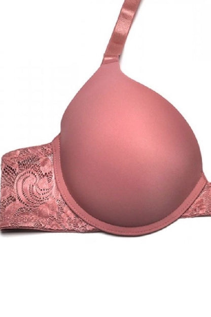 Pink bra with lace details on a white background