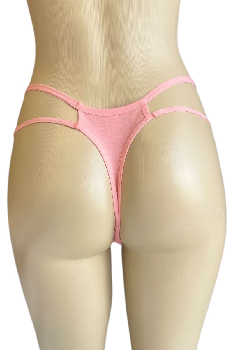 Pink thong on a beige mannequin against a white background
