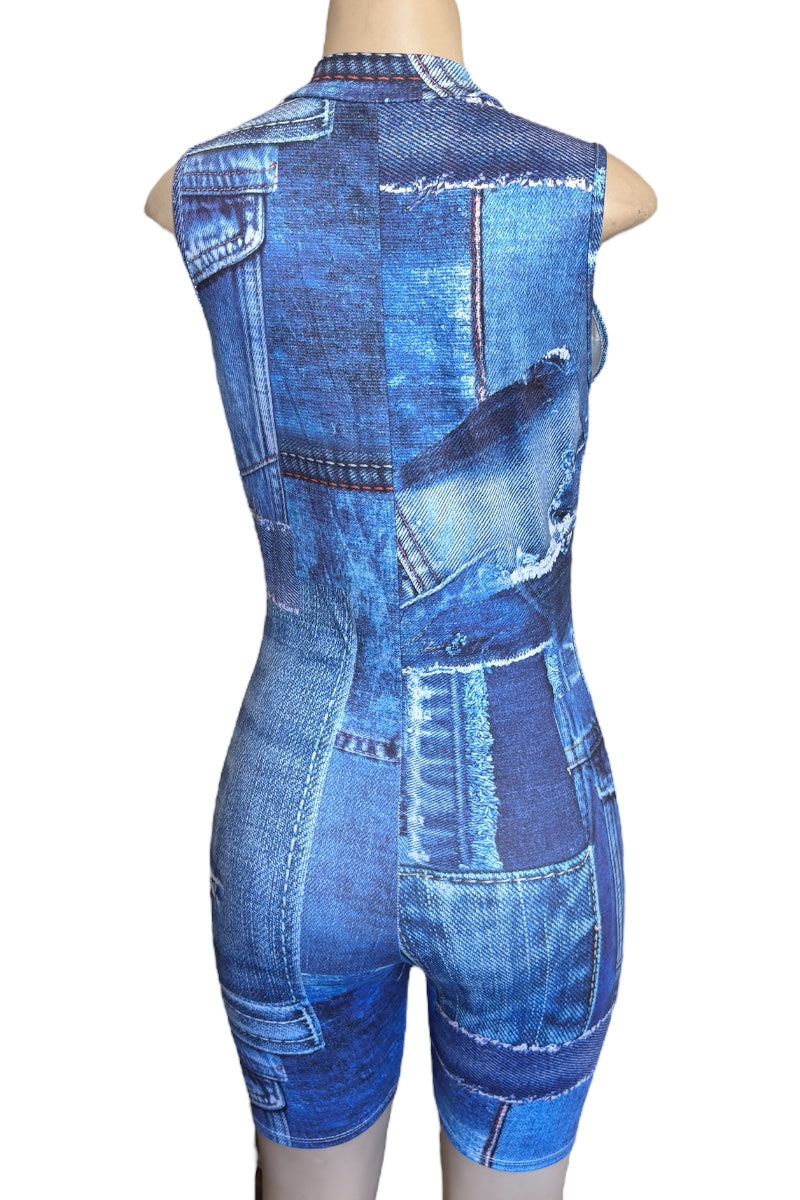 Blue denim patchwork romper on a mannequin against a white background