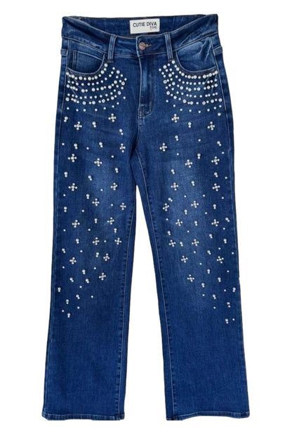 Blue jeans with decorative studs on a white background