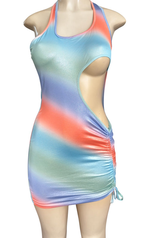 Multicolored dress on a mannequin against a white background