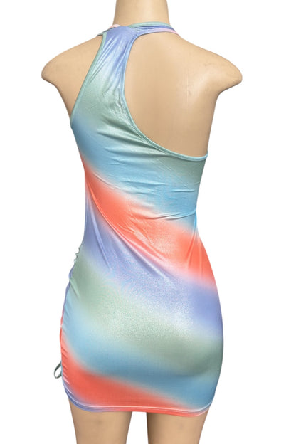 Multicolored dress on a mannequin against a white background