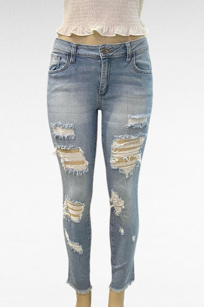 Mid Rise Destructed Skinny Jeans