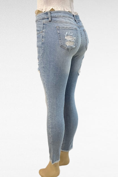 Mid Rise Destructed Skinny Jeans