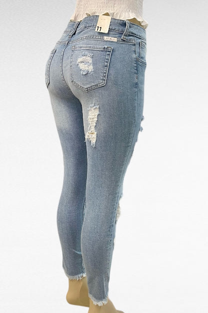 Mid Rise Destructed Skinny Jeans