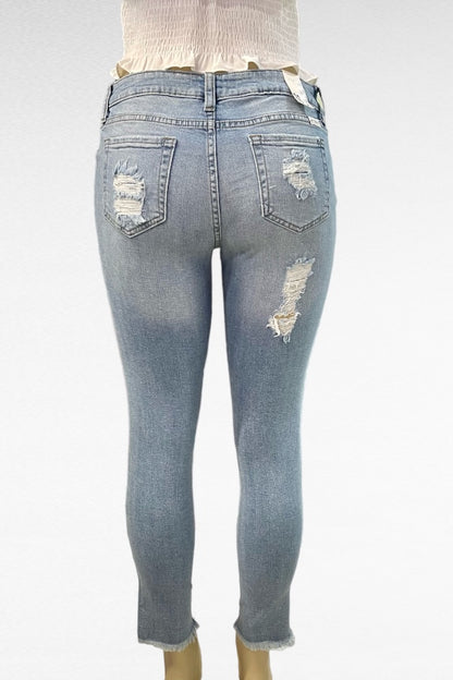 Mid Rise Destructed Skinny Jeans