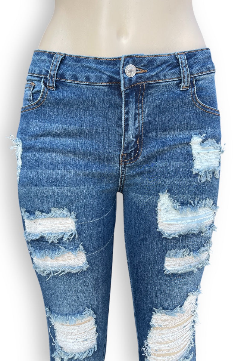 Super Distressed Mid Rise Jeans