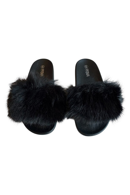 Black fur slides on a white background