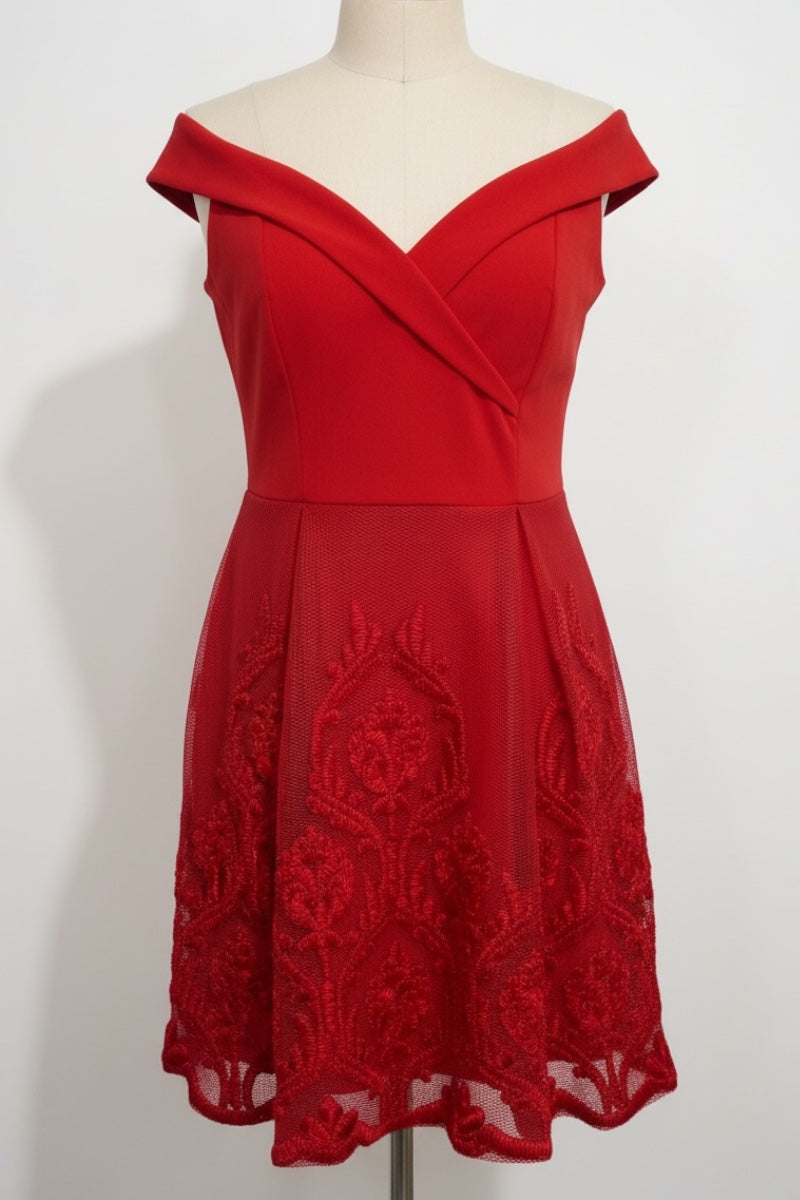 Red off-shoulder dress with lace details on a mannequin against a white background