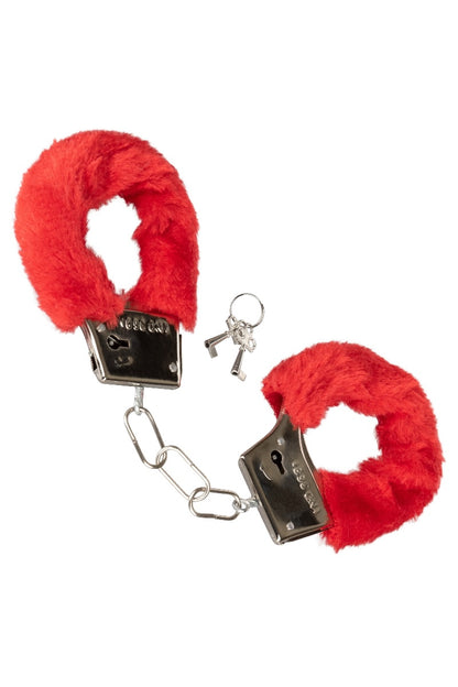 Red fluffy handcuffs with metal clasp on a white background