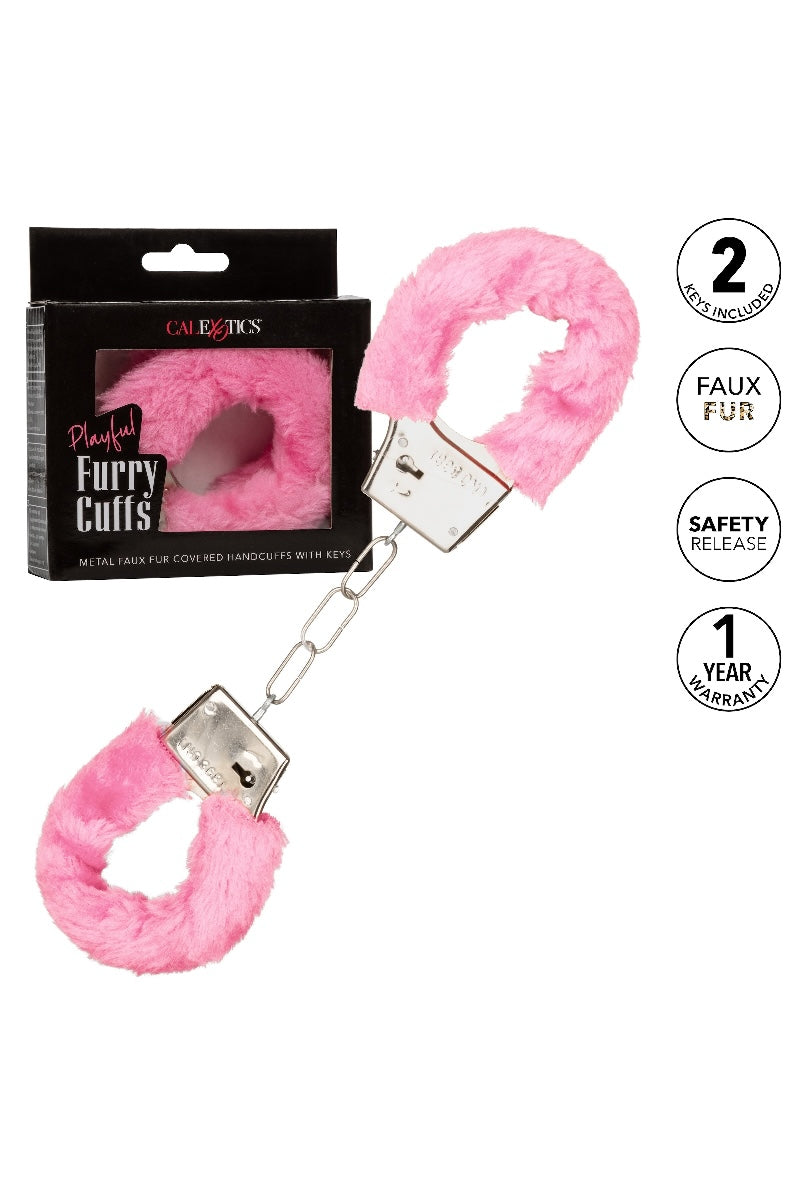 Pink faux fur handcuffs with packaging on a white background