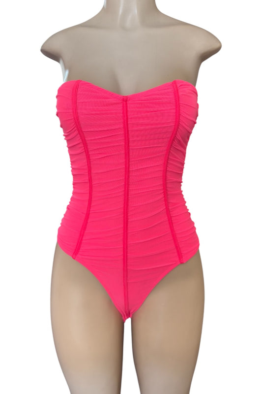 Hot pink strapless bodysuit on a mannequin against a white background