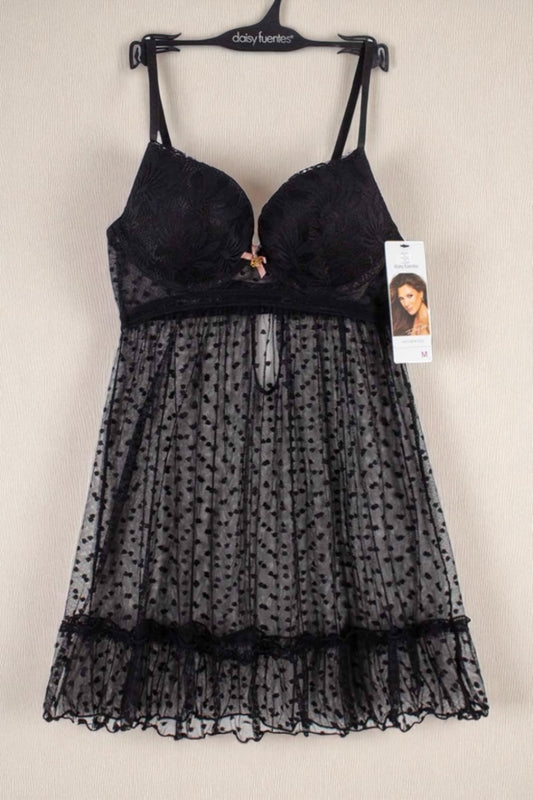 Black lace nightgown with a tag on a hanger against a white background
