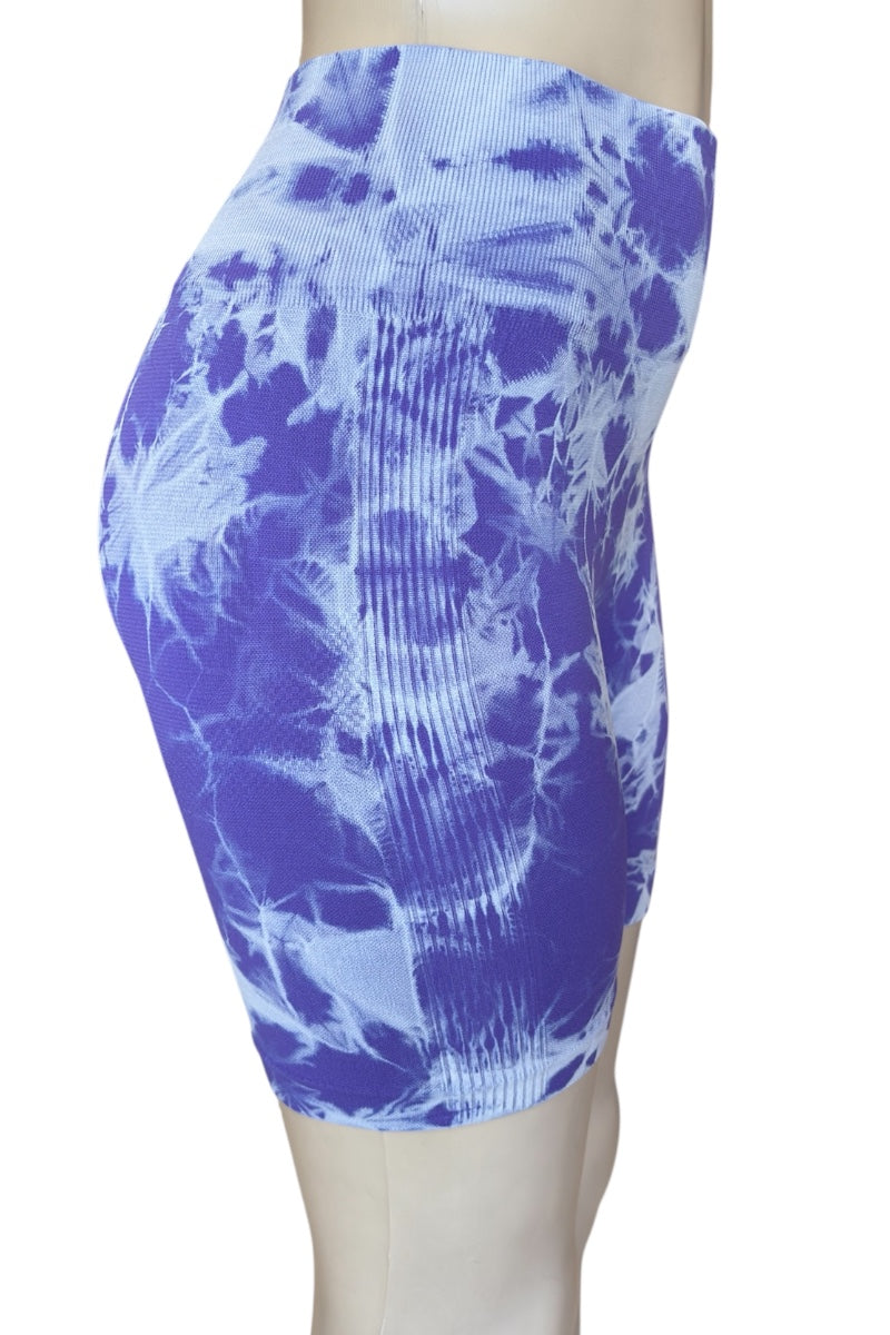 Purple patterned shorts on a mannequin against a white background