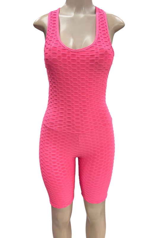 Pink textured sleeveless romper on a mannequin against a white background