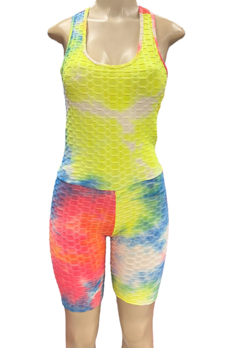 Colorful tie-dye athletic romper on a mannequin against a white background