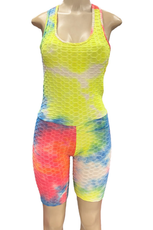 Colorful tie-dye athletic romper on a mannequin against a white background