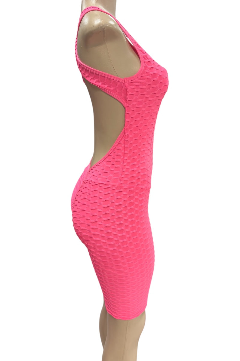 Pink textured romper on a mannequin against a white background
