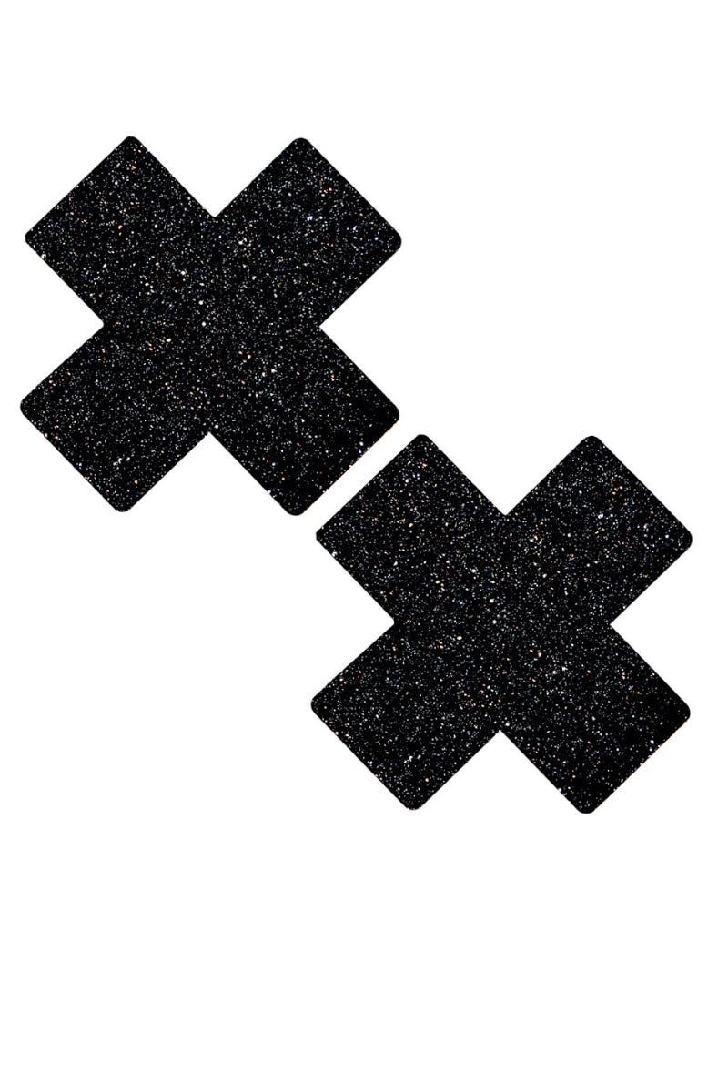 Two black X-shaped pasties on a white background