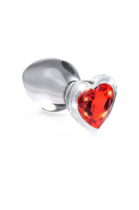 Metallic plug with a red heart-shaped gem on a white background