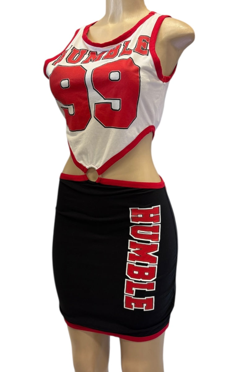 Red and white dress with 'HUMBLE' and number '99', on a mannequin.