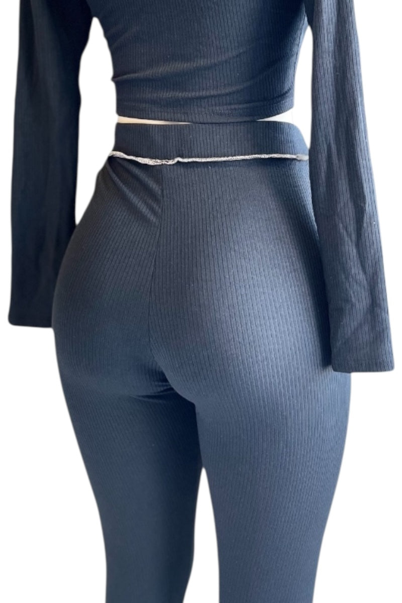 black ribbed leggings on a white background