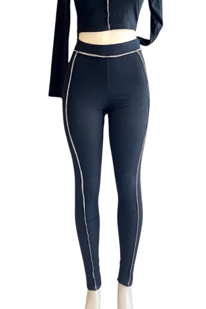 Black leggings with stripes on a white background