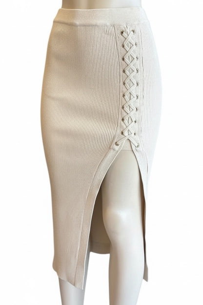 Beige ribbed skirt with lace-up front on a white background